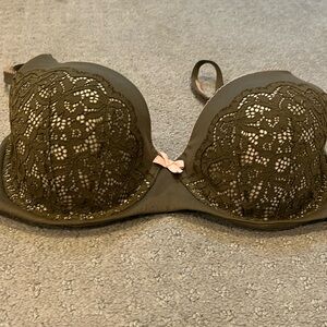 Green and pink Victoria’s Secret 34DD bra.